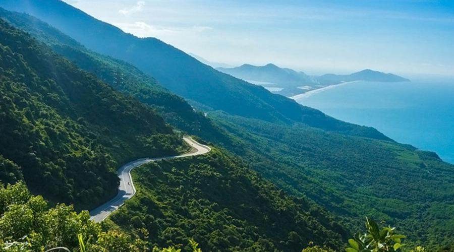 A winding road on a mountain AI-generated content may be incorrect.