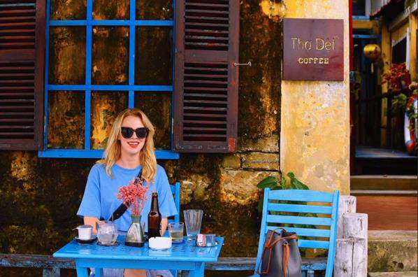 A person sitting at a table AI-generated content may be incorrect.